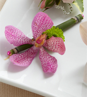 The FTD� Pink Mokara Boutonniere