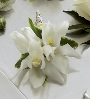 The FTD� White Mini Cymbidium Boutonniere